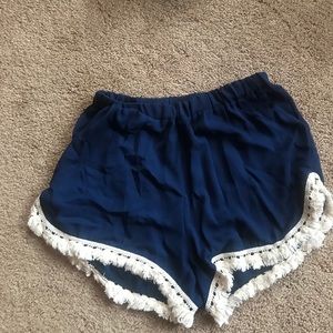 Navy blue flowy shorts with fringe